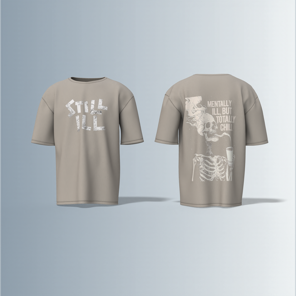 Oversized Round-Neck T-Shirt with Distressed "STILL ILL" Front Print and Back Graphic of Skeleton Smoking with the Quote "Mentally Ill, But Totally Chill" – Bold Statement Streetwear with Dark Humour Edge